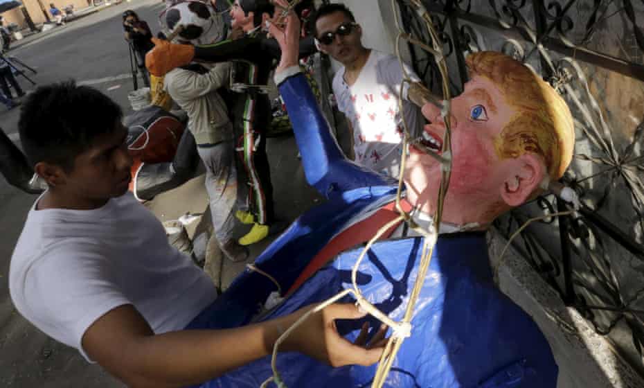 A craftsman making an effigy of Donald Trump at a workshop in Mexico City.