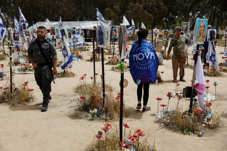 People visit the site of the Nova festival, where partygoers were killed and kidnapped during the 7 October Hamas attack, in Reim, southern Israel.