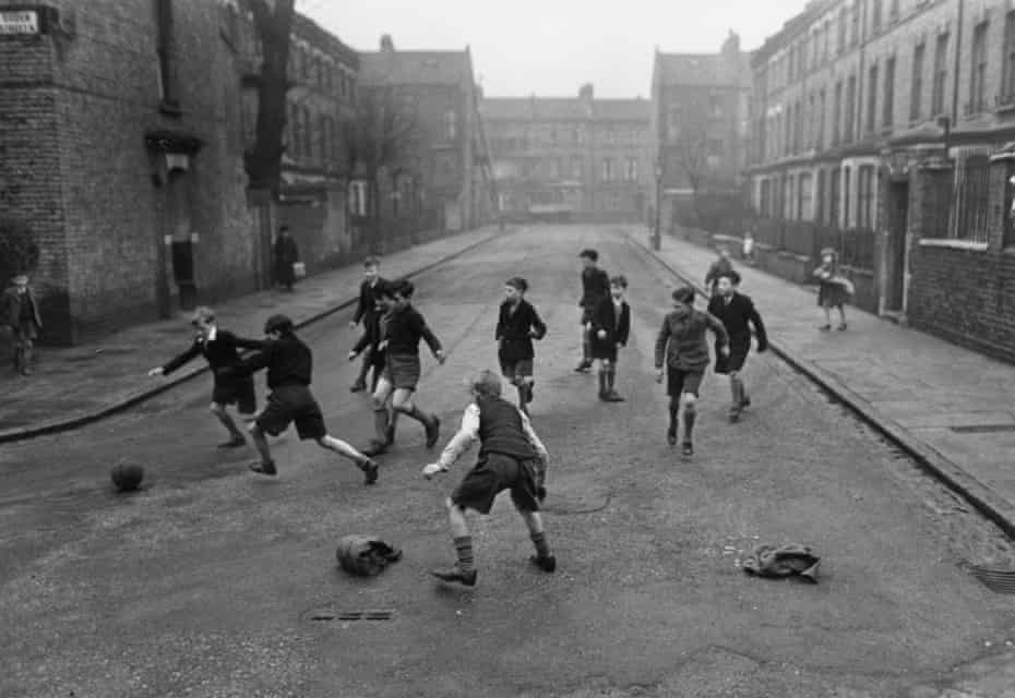 Children playing football in a London street, 1950