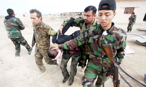 A Free Syrian Army fighter captured by Shia soldiers supporting President Assad.