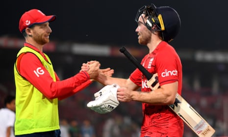 Jos Buttler congratulates Phil Salt after England beat Pakistan by eight wickets in the sixth T20 international of the seven-match series