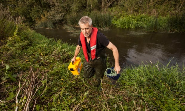 Swallowfield Angling Club member Russ Hatchet gets out of the water with his analysis kit.