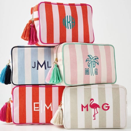 A stack of five striped wash bags