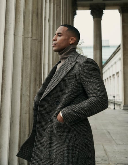 ‘I think I’m balanced’: Reggie Yates wears coat by reiss.com and roll neck by officinegenerale.com.