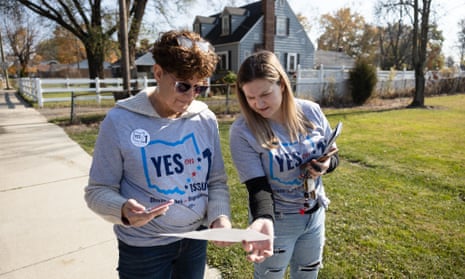 Pro-Choice canvasser Summer McLain, 27, and her mother Lorie McLain, 61, look at a map of a neighborhood on November 5, before canvassing ahead of the general election in Columbus, Ohio.