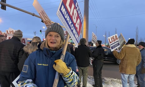 US Senator Lisa Murkowski, a Republican seeking reelection, attends a sign-waving event on a busy Anchorage corner on Election Day.