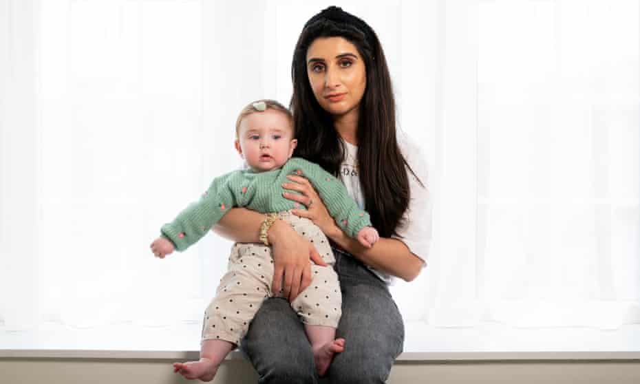 Sofia Shafaq with her eight-month-old daughter, Amara, at their home in Leeds.