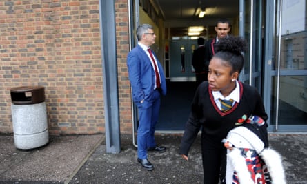 Gary Phillips and children leaving school
