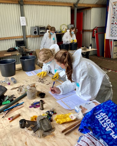Plastic removed from raceways is sorted as part of a septal bubble study.