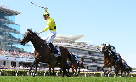 Without A Fight ridden by jockey Mark Zahra wins the 2023 Melbourne Cup at Flemington Racecourse