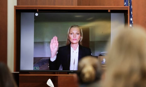 Kate Moss is sworn in via video link from her home in Gloucestershire at the court in Fairfax, Virginia.