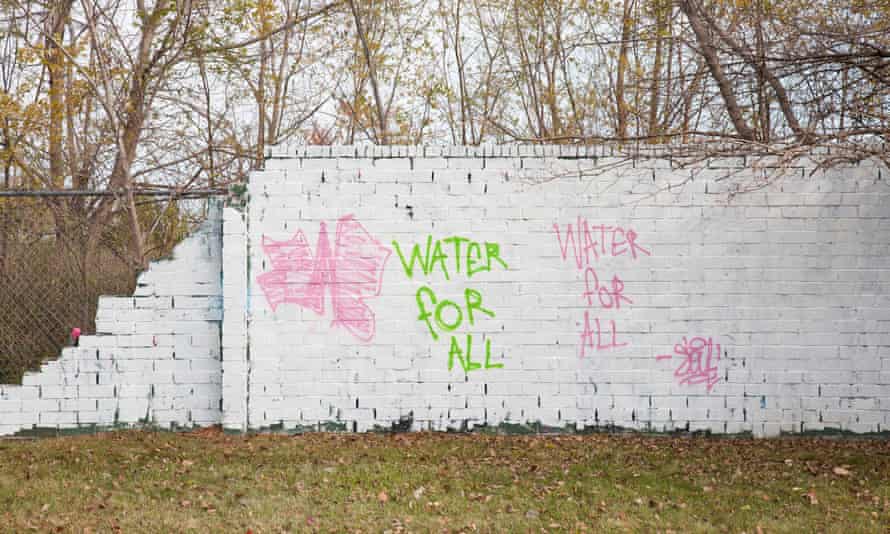 Graffiti addressing the water shutoffs covered various parts of Detroit in 2014. The city has since painted over almost all of the graffiti in that area, including the one shown.