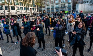 A group of Chilean women rehearsing the dance for Un Violador en Tu Camino during a demonstration in Amsterdam on 1 December.