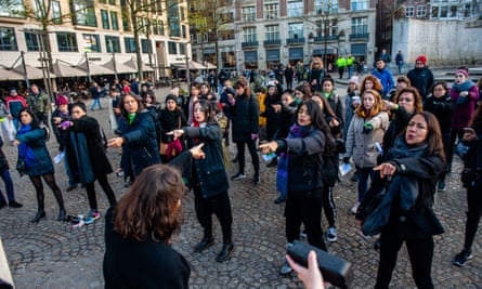 A group of Chilean women rehearsing the dance for Un Violador en Tu Camino during a demonstration in Amsterdam on 1 December.