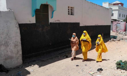 Students in Mogadishu wear face masks