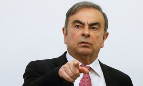 Former Nissan chairman Carlos Ghosn gestures during a news conference in Beirut.