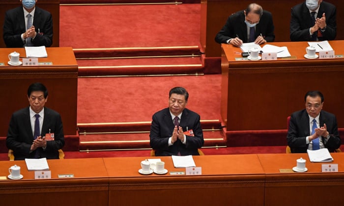 Li Zhanshu alongside Xi Jinping in China’s national legislature