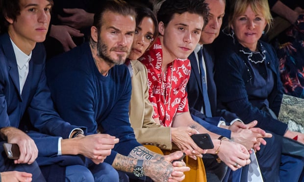 David, Victoria and Brooklyn Beckham at Paris fashion week