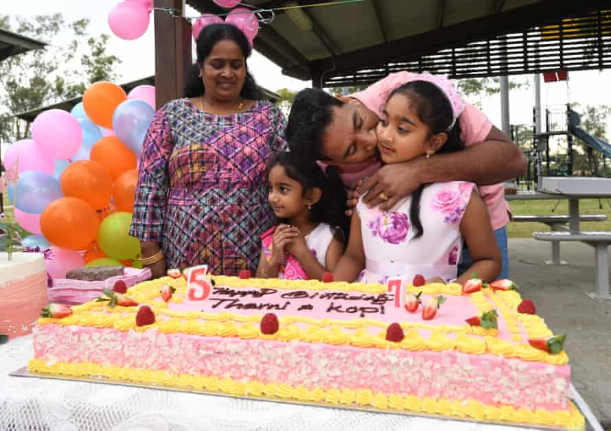 Tharnicaa (centre) celebrates her fifth birthday with her parents Priya and Nades Nadesalingam and her sister Kopika.