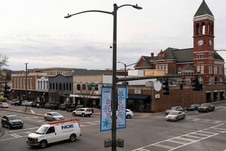 Vehicles pass through an intersection in downtown Rome, one of the two largest towns in Georgia’s 14th congressional district.