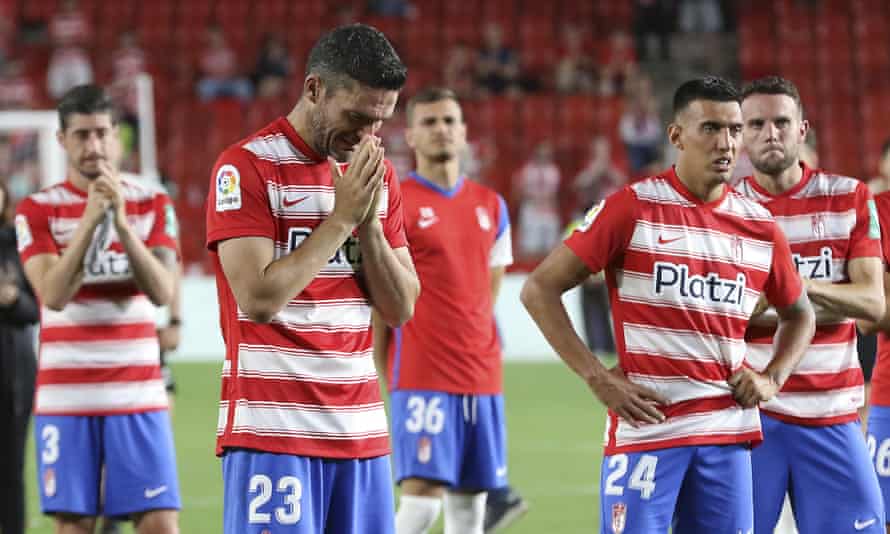 Granada players react after being relegated to the Spanish second tier.
