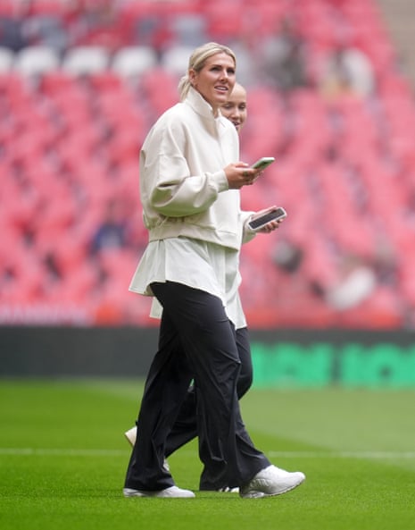 Chelsea captain Millie Bright checks out the Wembley pitch prior to the match