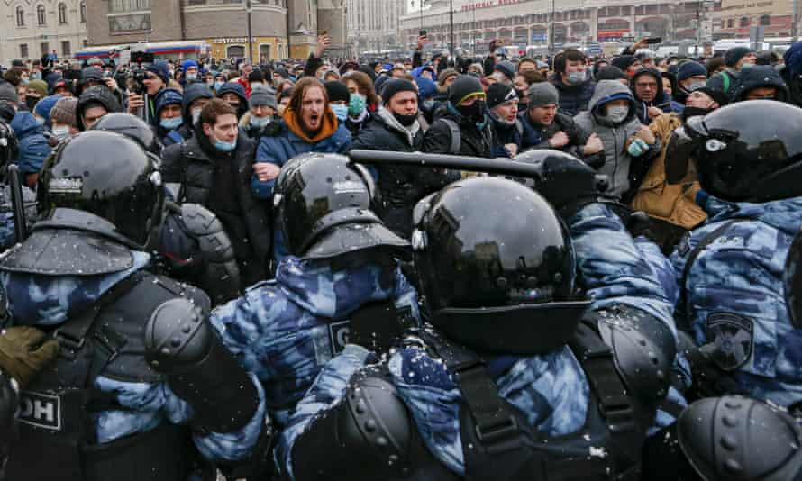 People clash with police during a protest against the jailing of opposition leader Alexei Navalny in Moscow, Russia last week.