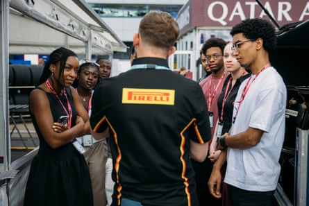 Chris Tagnon (third right) and Lily Owuye (second right) with Mission 44 scholars from their year