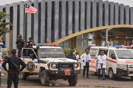 police stand guard outside