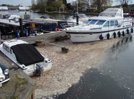 Sewage foam collects around boats at Bourne End Marina on the Thames path