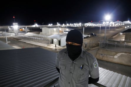 A prison warden at the Cecot complex.