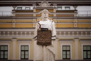 The statue of Grand Princess Olga of Kyiv is fitted with a mock flack jacket in Kyiv, Ukraine