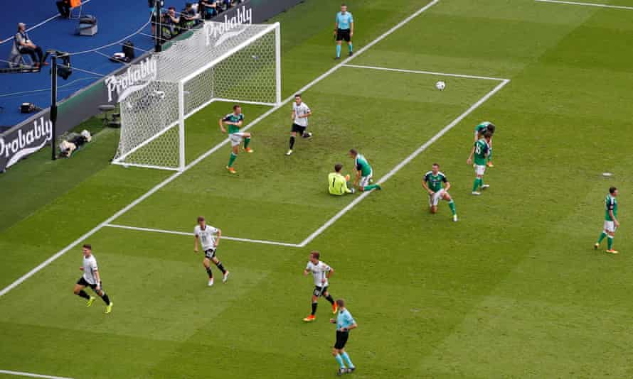 Mario Gómez, far left, celebrates scoring for Germany against a Northern Ireland team that defended very deep and in great numbers