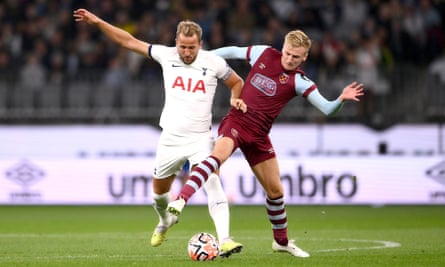 Flynn Downes (right) challenges Spurs’ Harry Kane in a pre-season friendly in Perth earlier this month