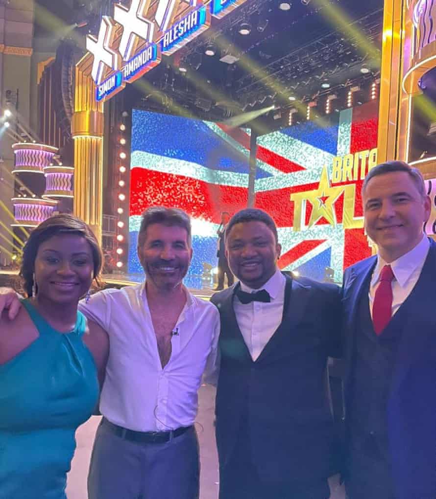 Alfred Oyekoya and his wife, Nancy, with Simon Cowell and David Walliams