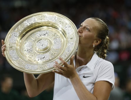 Petra Kvitova with the Wimbledon trophy in 2014.