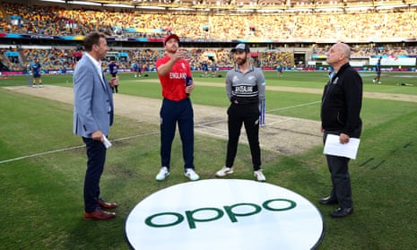 Jos Buttler of England and Kane Williamson of New Zealand take part in the coin toss.