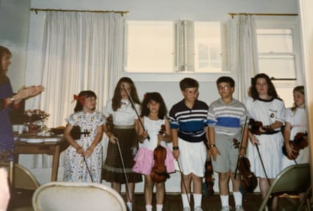 Jessica Chiccehitto Hindman as child, in the pink skirt.