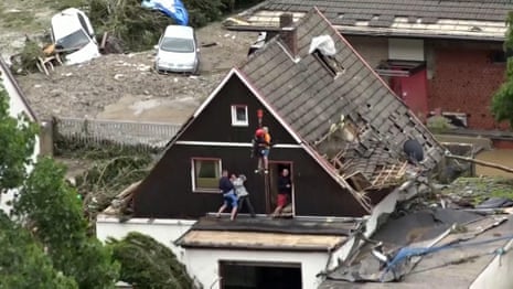 Germany floods: stranded residents rescued by helicopter from rooftops – video