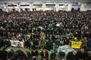 Worshippers attend a mourning prayer for Soleimani in Tehran