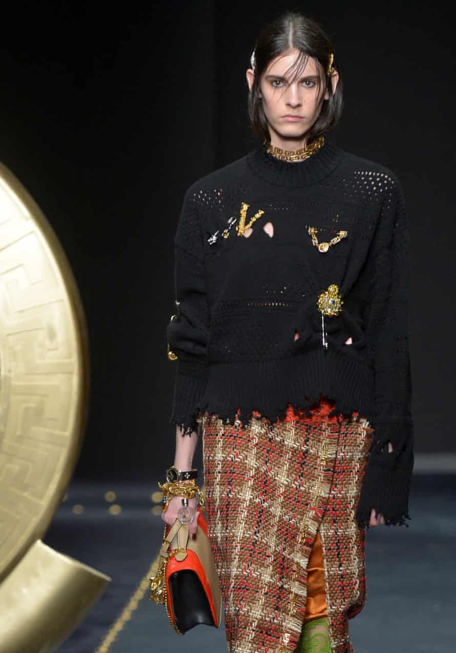 Keeping things together: the brooches at Versace.