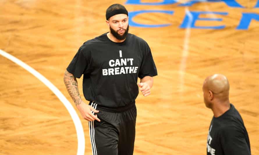 Clear signals: Brooklyn Nets guard Deron Williams wears a T-shirt to honour Eric Garner during warmups before a NBA game between the Cleveland Cavaliers and the Brooklyn Nets.