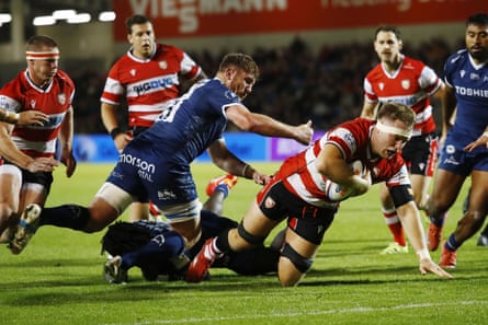 Jack Clement crashes over to give Gloucester the lead at the end of the first half against Sale.