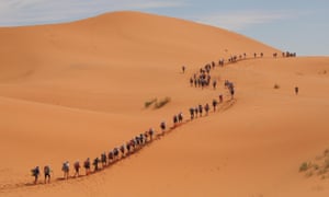 Hikers in a desert.