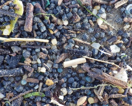 A close up of the beach with biobeads