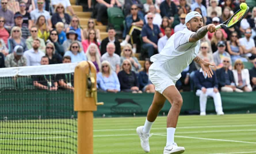 Nick Kyrgios returns the ball during his win