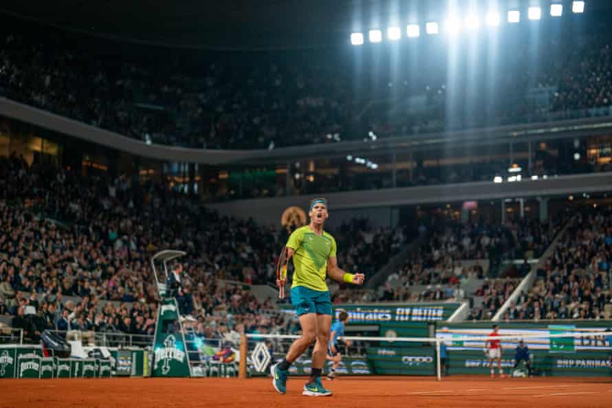 Rafael Nadal celebrates winning a point against Novak Djokovic.