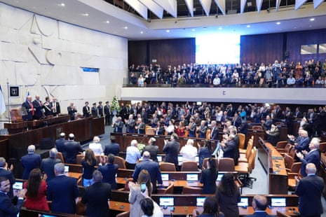 Donald Trump receives a standing ovation as he arrives to speak to the Knesset.