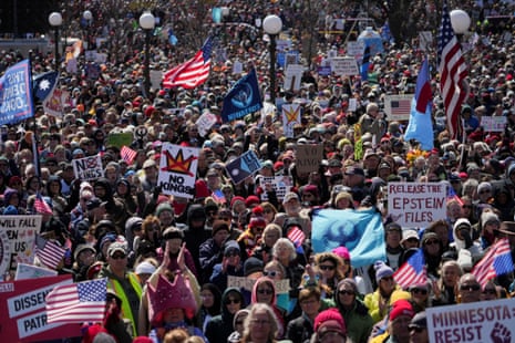 Demonstrators attend a