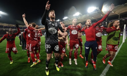 Brest players celebrate qualifying for the Champions League